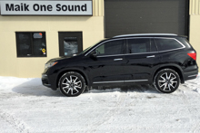 2019 Honda Pilot with dark privacy window tint